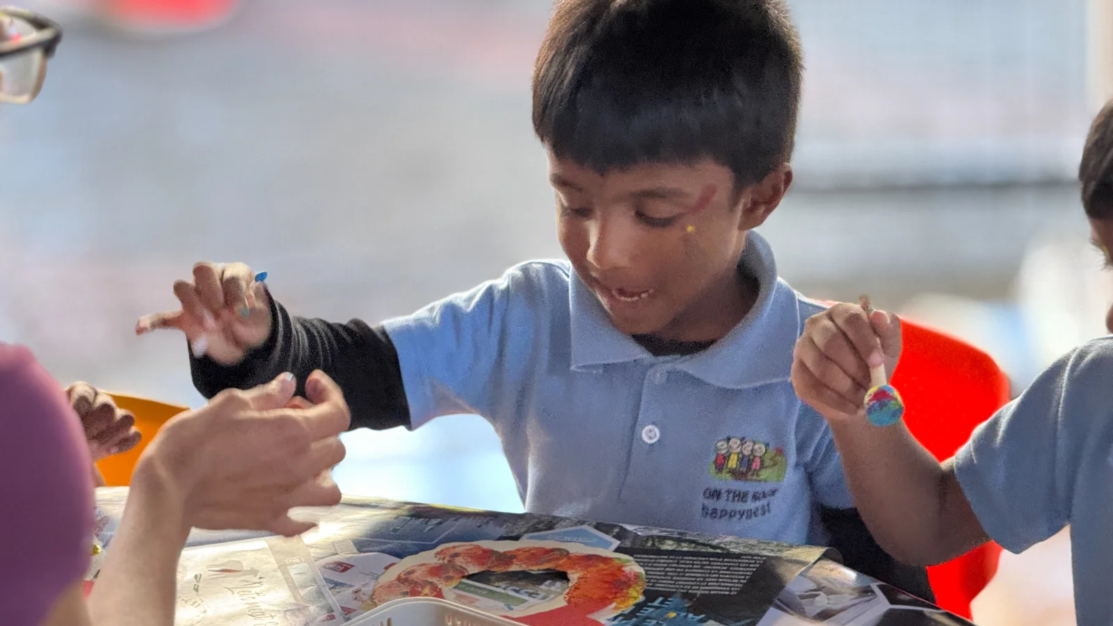 A child enjoying a hands-on activity at school