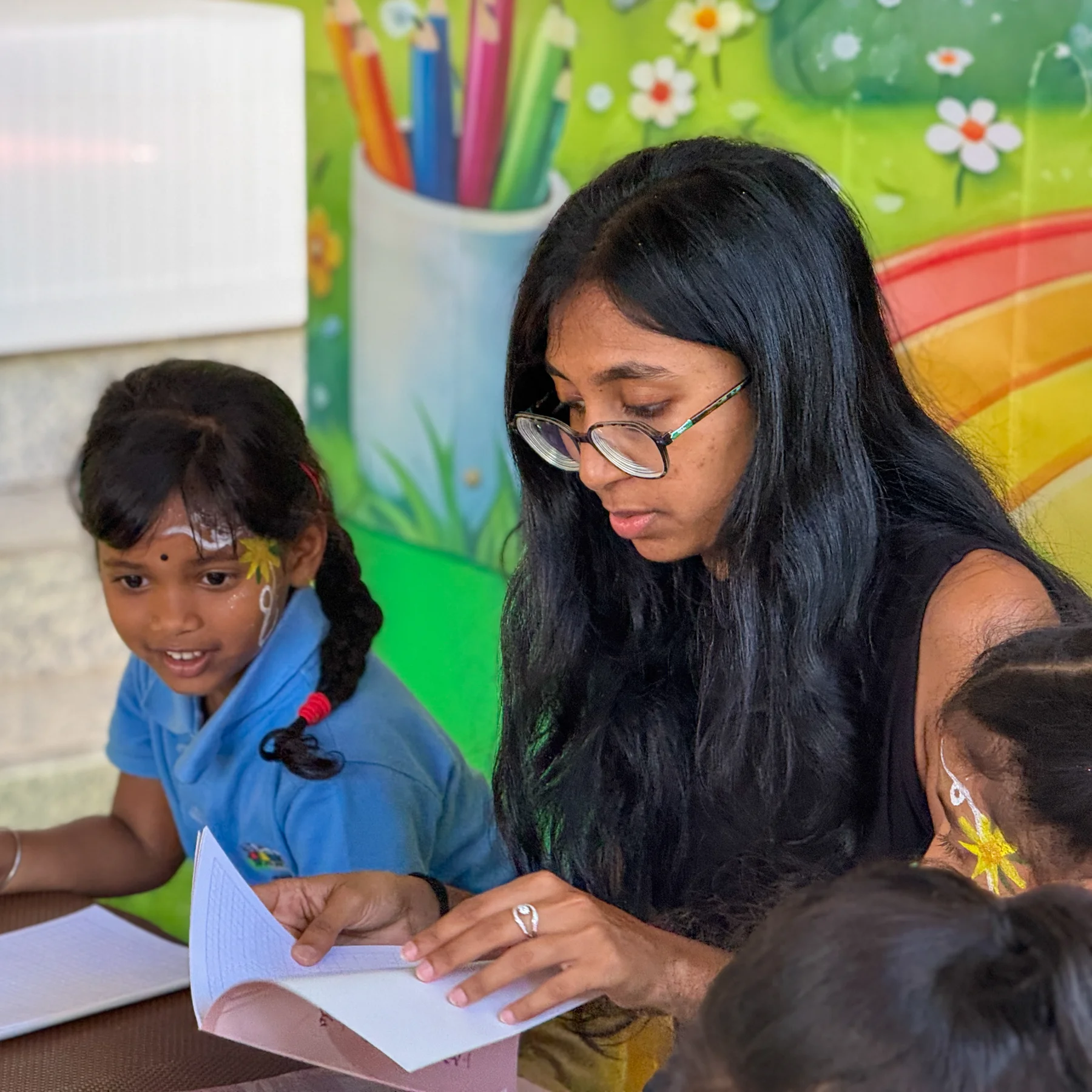 An educator reading with children